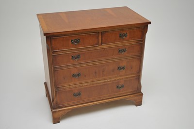 Lot 316 - A yew veneered chest of two short and three...