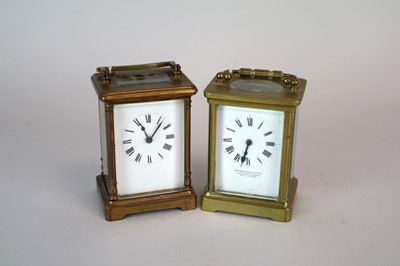 Lot 291 - A small French brass carriage clock, the white...
