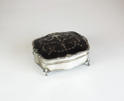 Lot 12 - An early 20th century silver and tortoiseshell mounted dressing table box