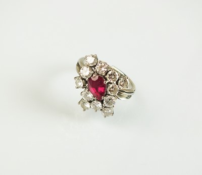 Lot 70 - A ruby and diamond dress ring