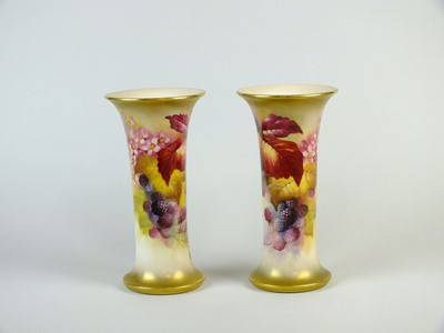 Lot 288 - A pair of large Royal Worcester vases painted by Kitty Blake