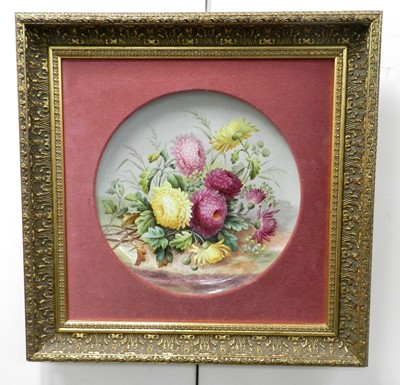 Lot 220 - Early 20th century floral earthenware plaque