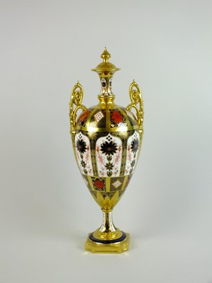 Lot 289 - A pair of Royal Crown Derby twin-handled vase and covers