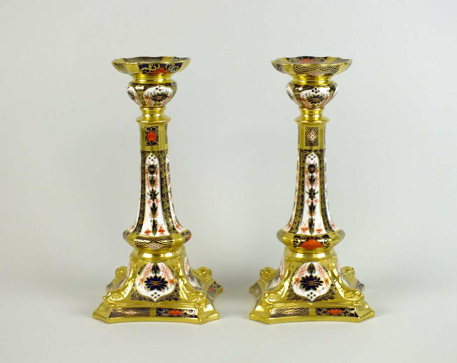 Lot 292 - A pair of Royal Crown Derby imari candlesticks