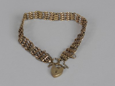 Lot 164 - A 9ct gold four bar gate link bracelet