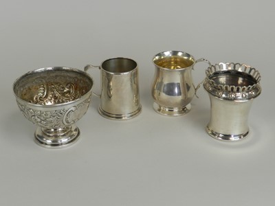 Lot 91 - Two silver mugs, a silver bowl and a silver vase
