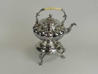 Lot 96 - A 19th century electroplated kettle on stand