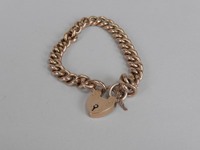 Lot 179 - A yellow metal hollow curb link bracelet