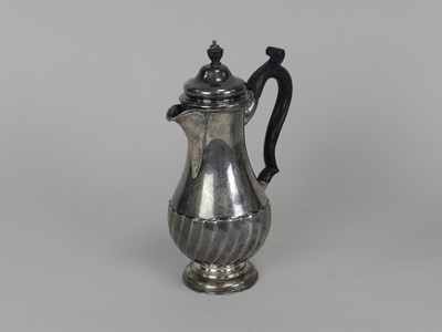 Lot 99 - A Victorian silver hot water jug
