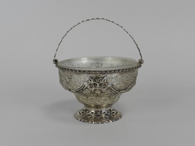 Lot 100 - A Victorian silver swing handled basket