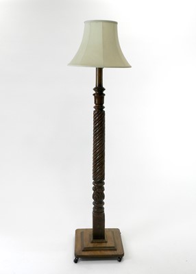 Lot 497 - A late Victorian mahogany standard lamp, with...