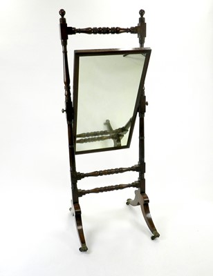 Lot 501 - A late Victorian mahogany cheval mirror, the...