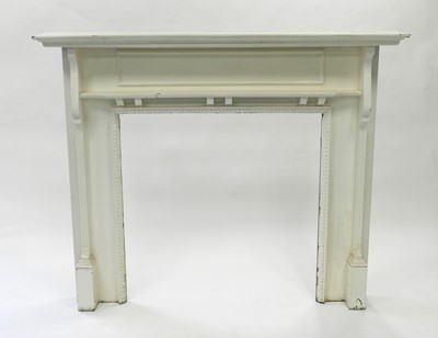 Lot 503 - An Edwardian painted pine fire surround, with...