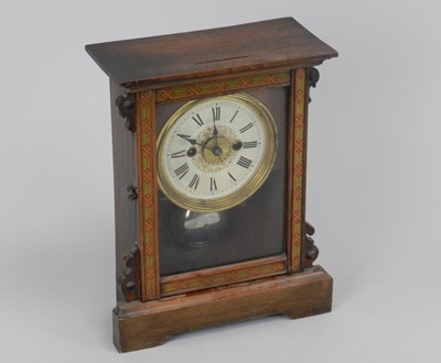 Lot 409 - An early 20th century alarm shelf clock, 29cm...