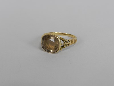 Lot 134 - A late 18th century foil backed rock crystal ring