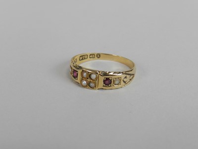 Lot 138 - A Victorian 18ct gold split pearl and  untested ruby ring