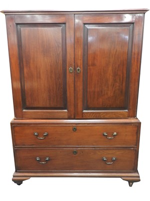 Lot 468 - An early 19th century mahogany linen press,...