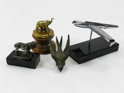 Lot 378 - A group of four various metal mascots...