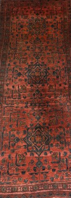 Lot 549 - A Persian prayer rug or short runner, with...