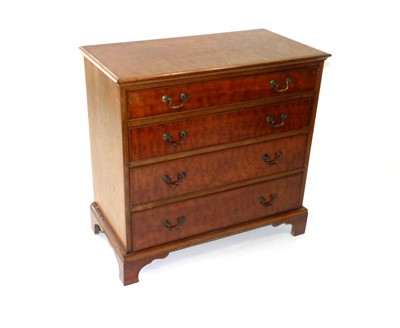 Lot 513 - A reproduction walnut chest of drawers, early...