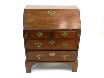 Lot 470 - A George III mahogany bureau, the fall front...