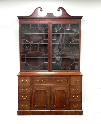 Lot 435 - A George III mahogany secretaire bookcase, the...