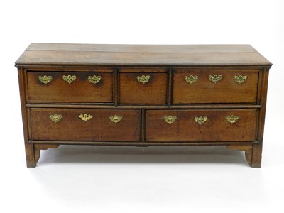 Lot 431 - An 18th century oak dresser base, reduced...