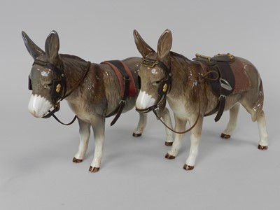 Lot 245 - A pair of Sylvac donkeys