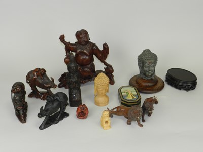 Lot 318 - A group of Chinese and South East Asian wooden...