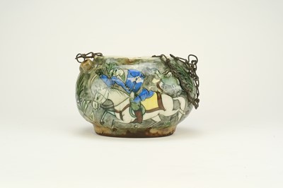 Lot 345 - A Qajar underglaze-painted pottery kashkul, 19th century