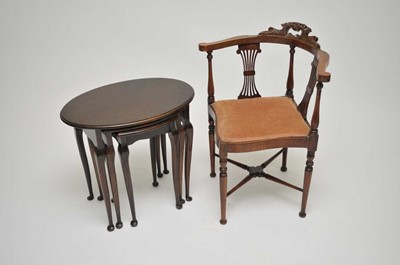 Lot 480 - A small mahogany nest of three tables, the...