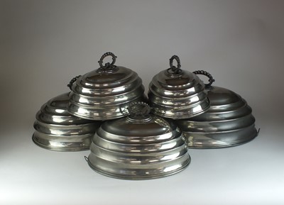 Lot 20 - A set of five graduated silver plated meat covers