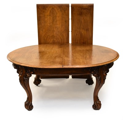 Lot 332 - A Victorian, honey-coloured, figured oak extending dining table