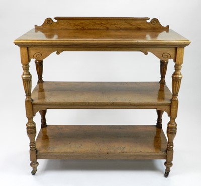 Lot 460 - A Victorian figured oak, three-tier buffet, of...