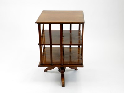 Lot 463 - An early 20th century walnut revolving...