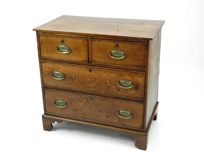 Lot 466 - An early 19th century oak chest of drawers,...