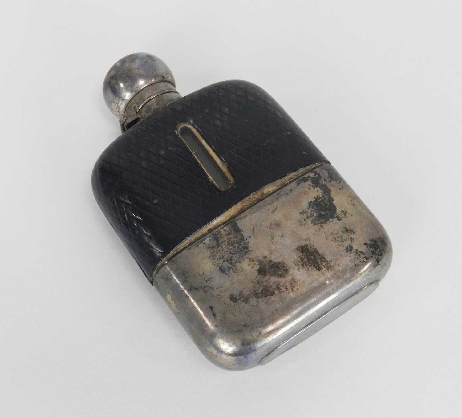 Lot 8 - A silver mounted hip flask
