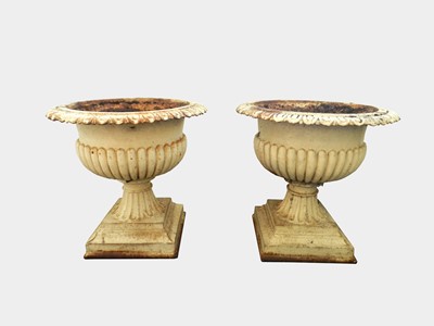 Lot 469 - A pair of cast iron garden urns, 19th/20th century