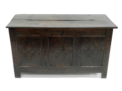 Lot 486 - A 17th century coffer, later carved, the...