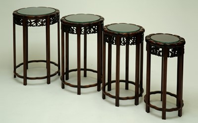 Lot 340 - A set of four graduated Chinese rosewood tables, probably Republic