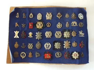 Lot 222 - A collection of forty-five military cap badges