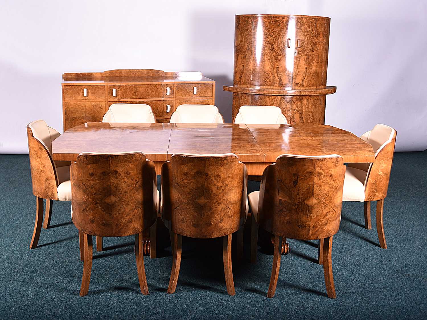 Lot 448 - A good art deco walnut dining suite, 'The Celerity', in the manner of Epstein