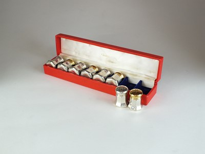 Lot 9 - A set of silver gilt Cartier salt and pepper shakers