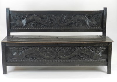 Lot 401 - A 19th Century Eastern influence carved joined...