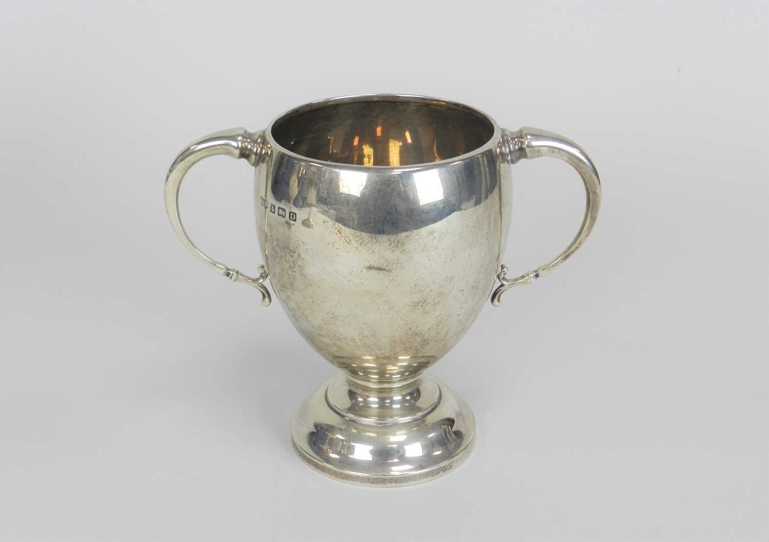 Lot 12 - A silver presentation two handled trophy cup