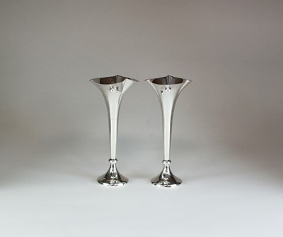 Lot 16 - A pair of silver mounted posy vases