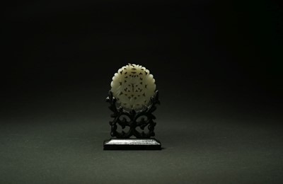 Lot 333 - A Chinese pale green jade pendant, Qing Dynasty