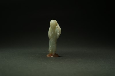Lot 335 - Two Chinese jade carved figures, 19th century