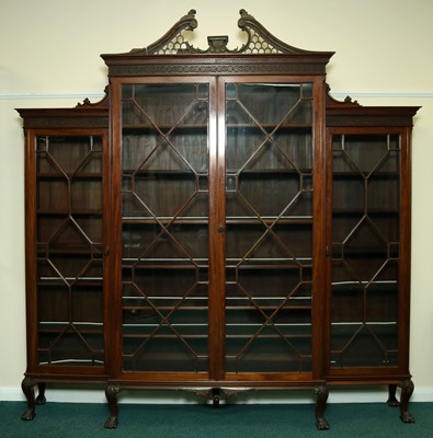 Lot 452 - A George III style mahogany break-front glazed display cabinet