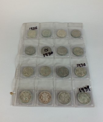 Lot 152 - A collection of twelve George V half crowns